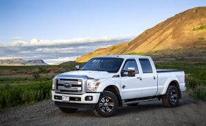 A white Toyota Hilux on a super jeep adventure