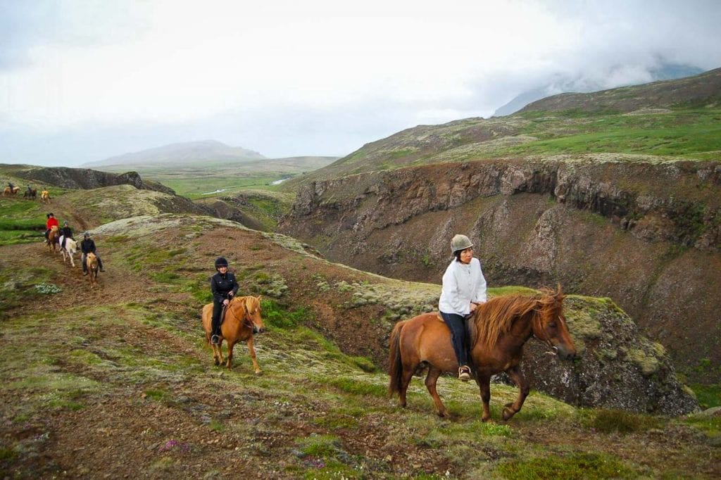 Horse riding on lava fields