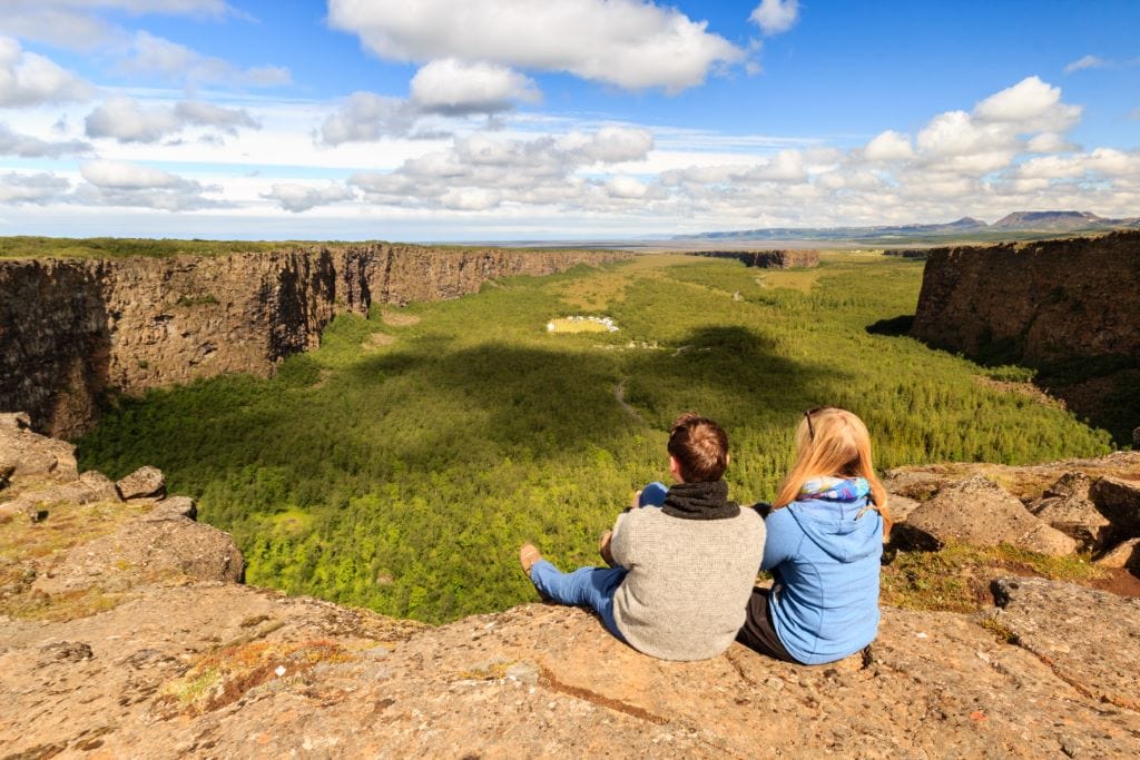 Hikers at Asbyrgi canyon in North Iceland