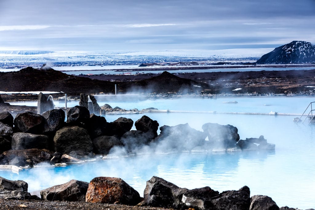 Steaming geothermal water in the wintry landscape