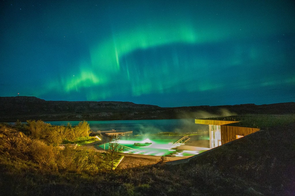 Norrthern Lights over Vök Baths East Iceland