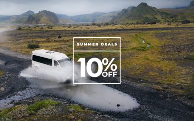 An off-road vehicle driving through a river in Iceland, promoting summer deals with up to 10% off on selected tours.