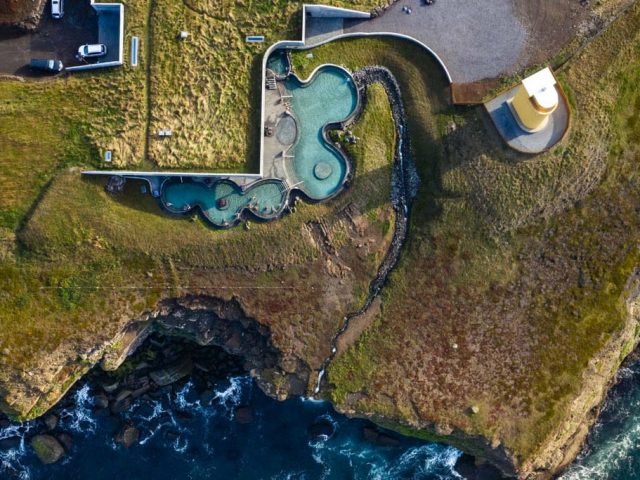 Aerial view of the GeoSea baths located on the top of a cliff in North Iceland