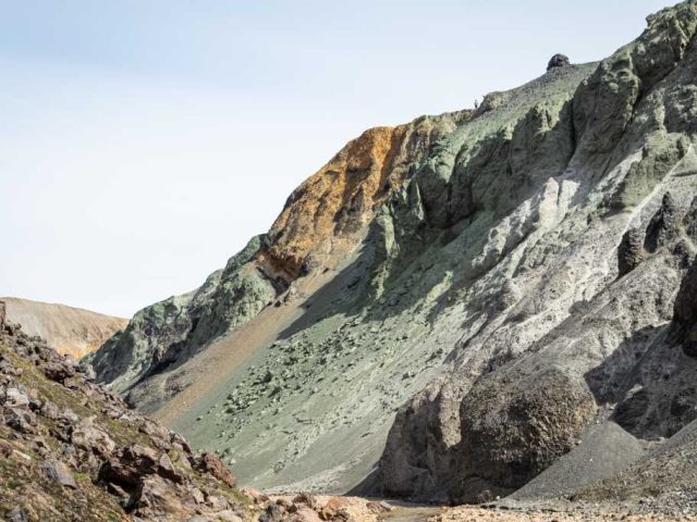 Rugged, multicolored hills in the Iceland Highlands on a Landmannalaugar tour.