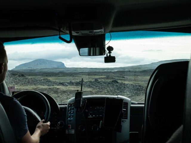 Driver's perspective inside a superjeep exploring Landmannalaugar in the Iceland Highlands.