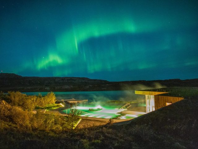 Norrthern Lights over Vök Baths East Iceland
