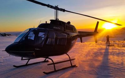 Iceland fire and ice helicopter tour wintry landscape sunset