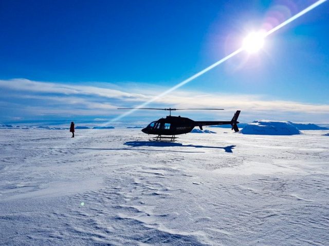 landing on a glacier with helicopter