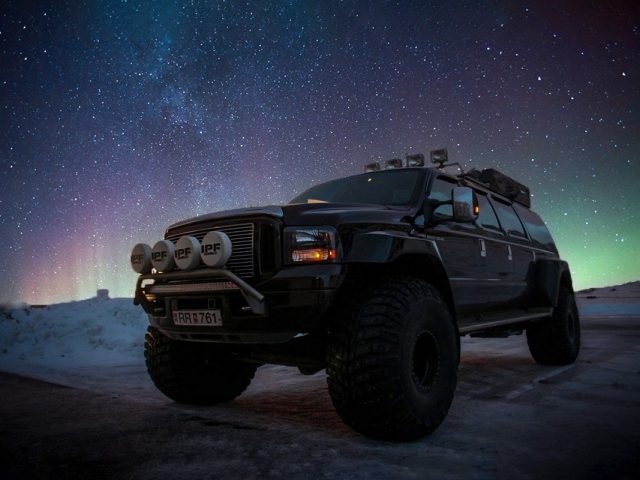 Hunting the Northern Lights by a Super Jeep