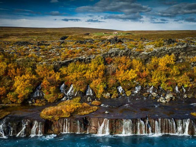 Visiting the Hraunfossar waterfall on the Silver Circle super jeep tour